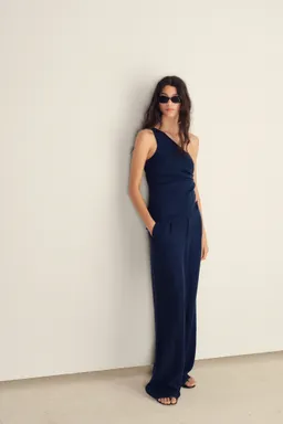 Pantalón wideleg lyocell pinzas de Mango en Pantalones para argentina