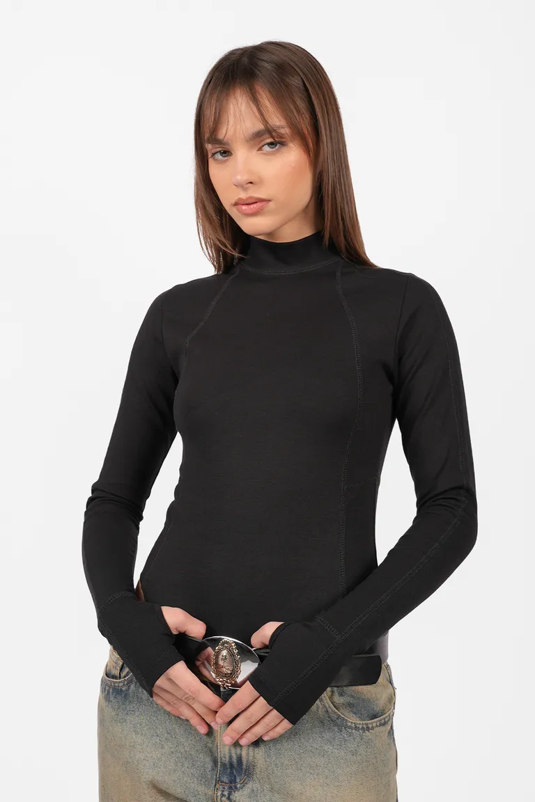 Body negro de manga larga con detalles de bordado y puños con mitones de Top White en Bodies para argentina