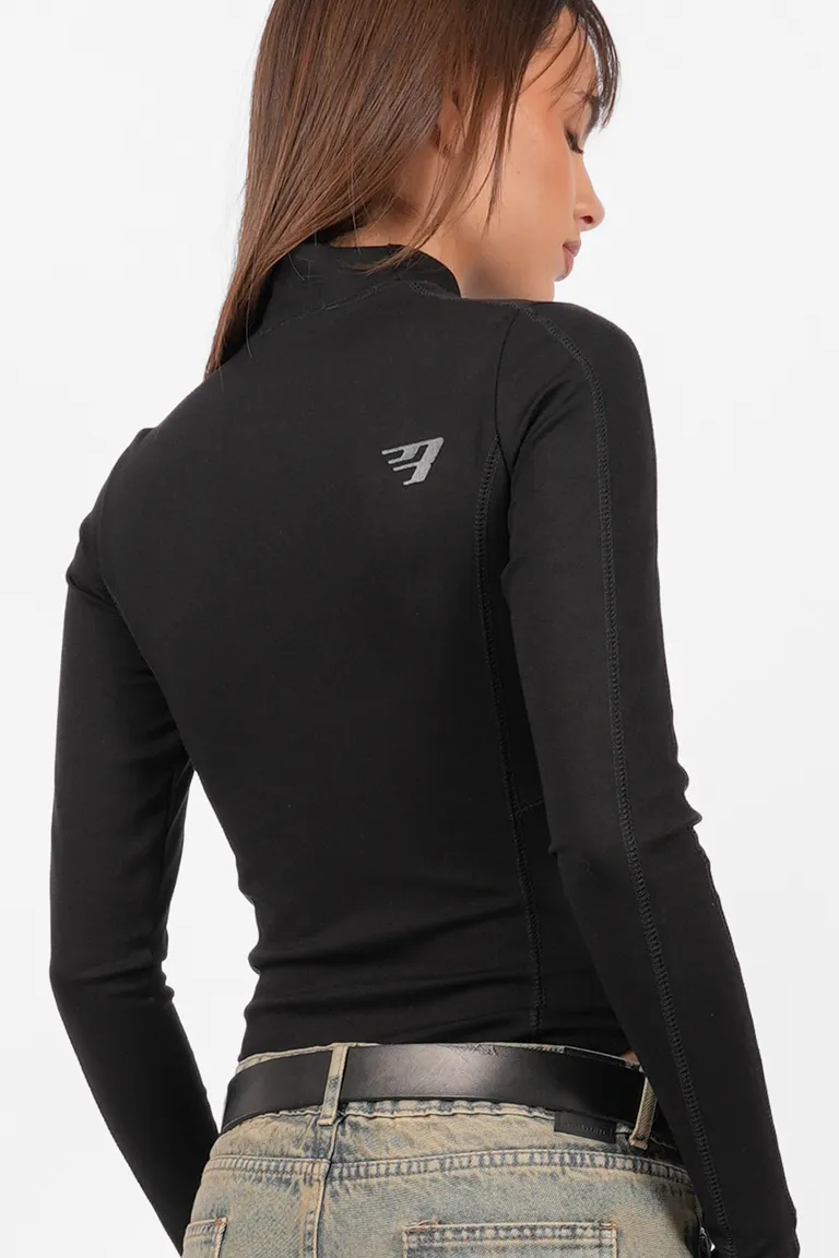 Body negro de manga larga con detalles de bordado y puños con mitones de Top White en Bodies para argentina