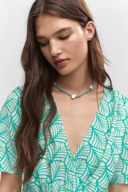 Vestido estampado corto cruzado de Mango en Vestidos para argentina