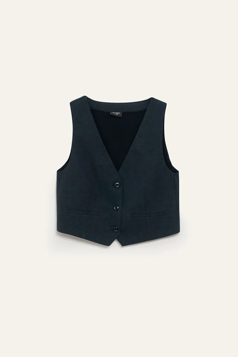 Chaleco entallado de corte sastre en color negro para un look urbano y elegante de 47 Street en Chalecos para argentina