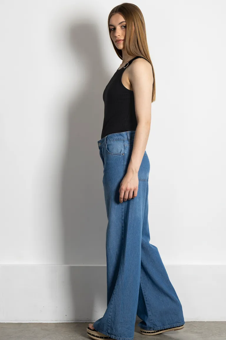 Remera negra de musculosa con aviopasador metálico en el hombro de Kill en Remeras para argentina