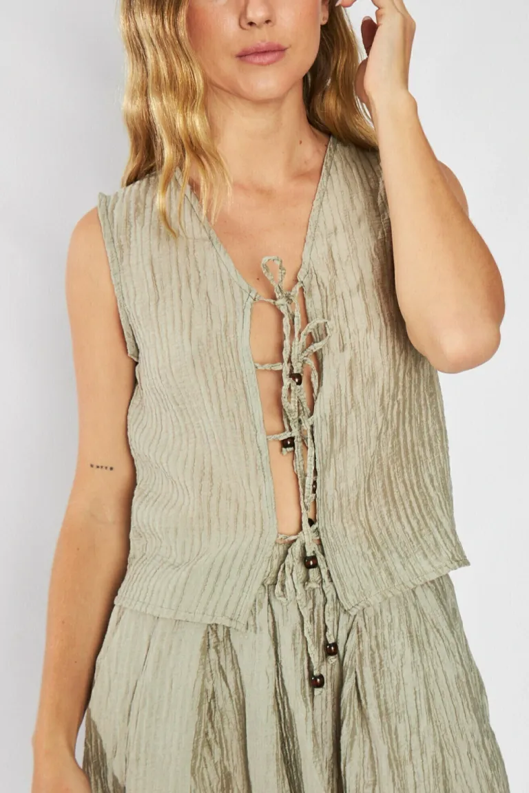 Blusa plisada con lazos en el frente para un look elegante y moderno de Belle en Blusas para argentina