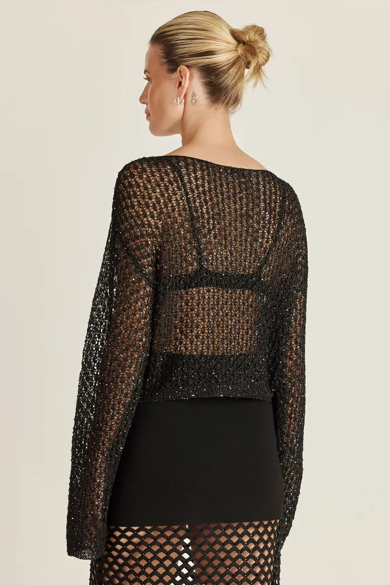 Sweater negro de tejido con lentejuelas, diseño transparente y moderno de Tucci en Buzos y Sweaters para argentina