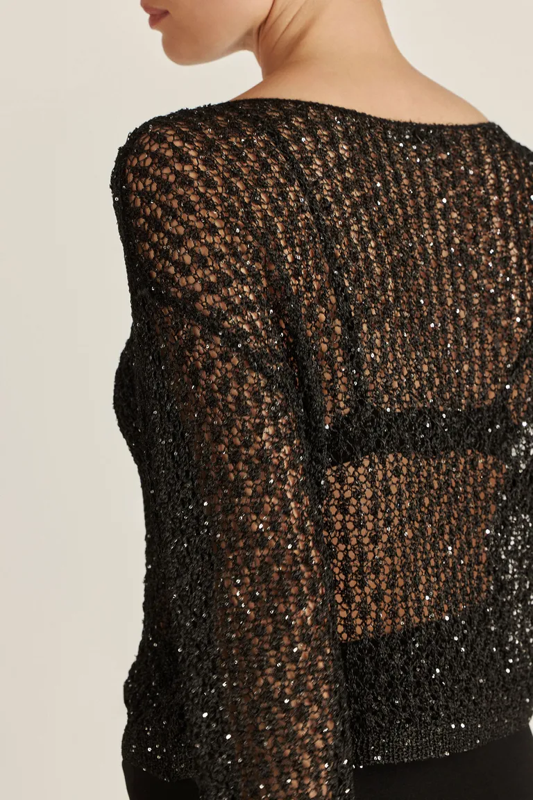 Sweater negro de tejido con lentejuelas, diseño transparente y moderno de Tucci en Buzos y Sweaters para argentina