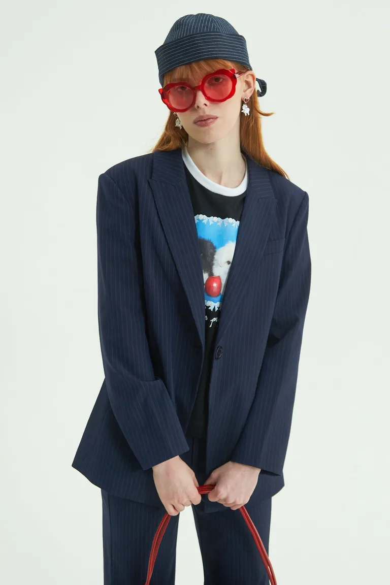 Blazer azul tizado con solapa, bolsillos y un único botón al frente de Las Pepas en Blazers para argentina