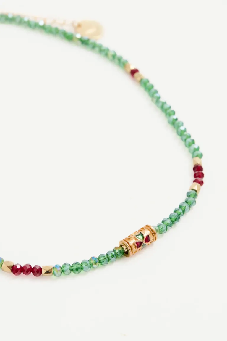 Collar de cuentas facetadas verde y detalles metálicos dorados de Rapsodia en Bijouterie para argentina