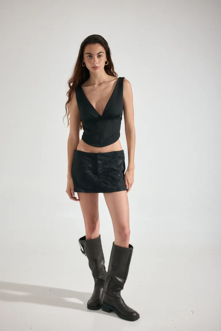 Conjunto de falda corta y top en tono negro con bordados de Audaz en Faldas para argentina