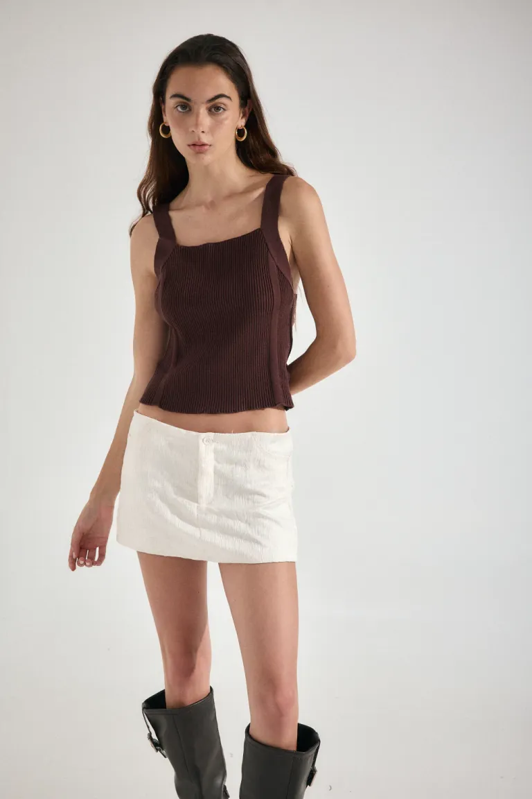 Conjunto de falda corta y top en tono negro con bordados de Audaz en Faldas para argentina