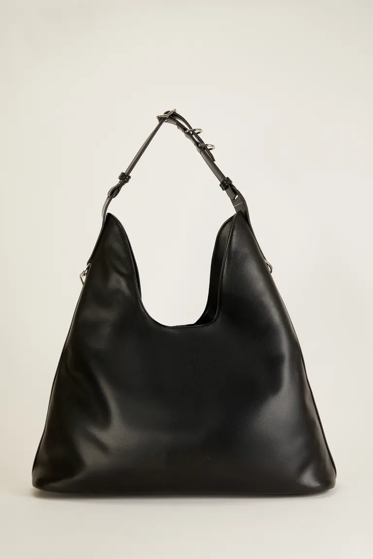 Cartera de cuero ecológico de diseño minimalista y canchero de Tucci en Bolsos y Carteras para argentina