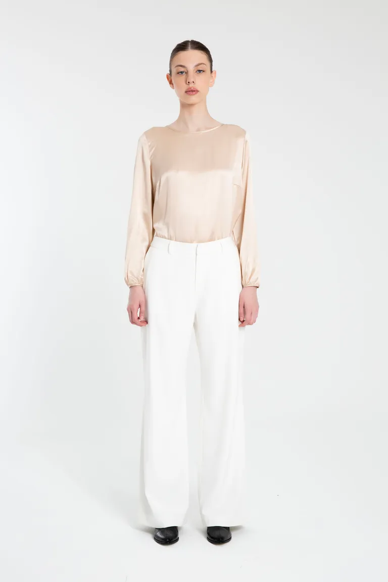 Pantalón de crepe blanco con cierre y presillas para un look elegante y moderno de Naíma en Pantalones para argentina