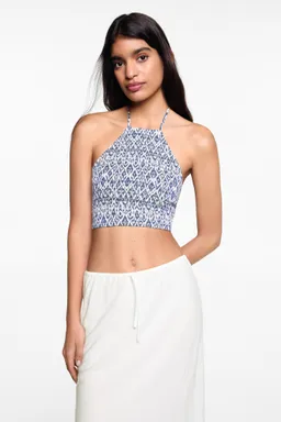 Top crop halter estampado de Mango Teen en Tops para argentina