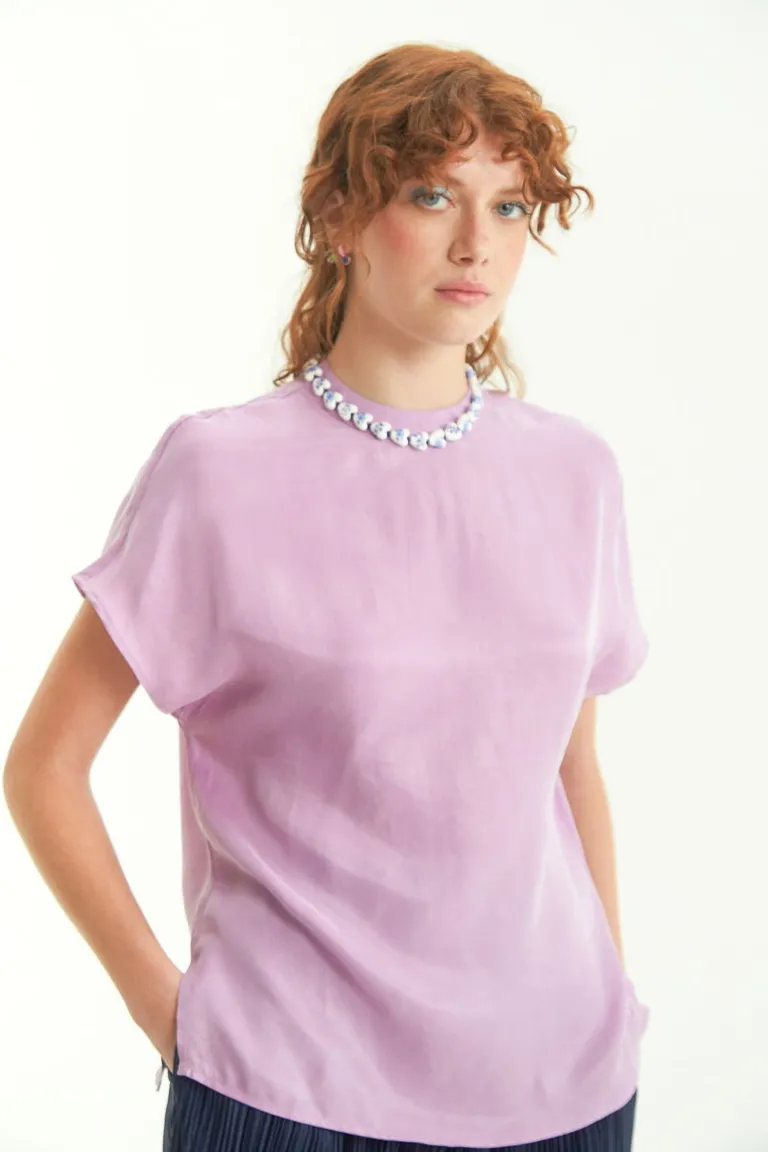 Blusa de diseño minimalista con detalles únicos de Las Pepas en Blusas para argentina