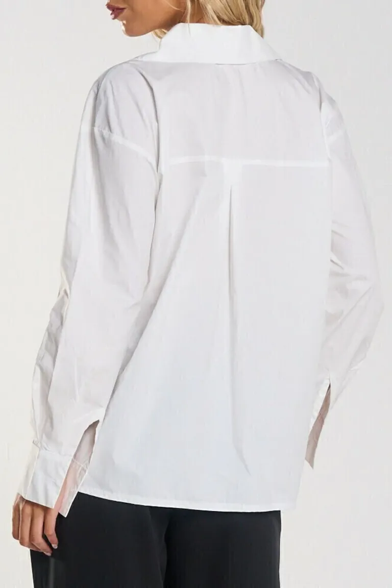 Camisa blanca de manga larga con corte canesu, confeccionada en poplin de Belle en Camisas para argentina