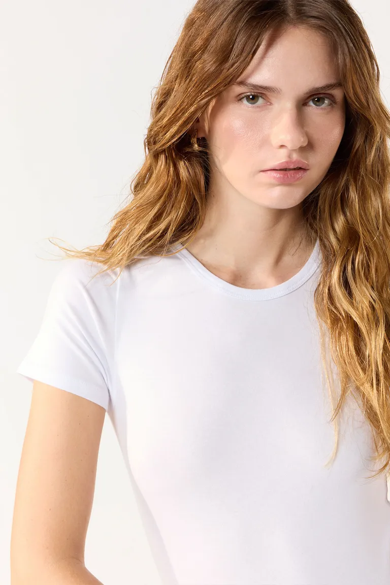 Body de mujer con cuello redondo y cierre inferior de Cuesta Blanca en Bodies para argentina