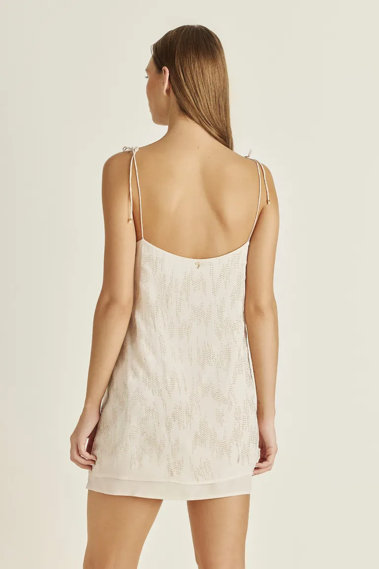 Vestido de gasa crepé con diseño exclusivo de tachas bombé de Tucci en Vestidos para argentina