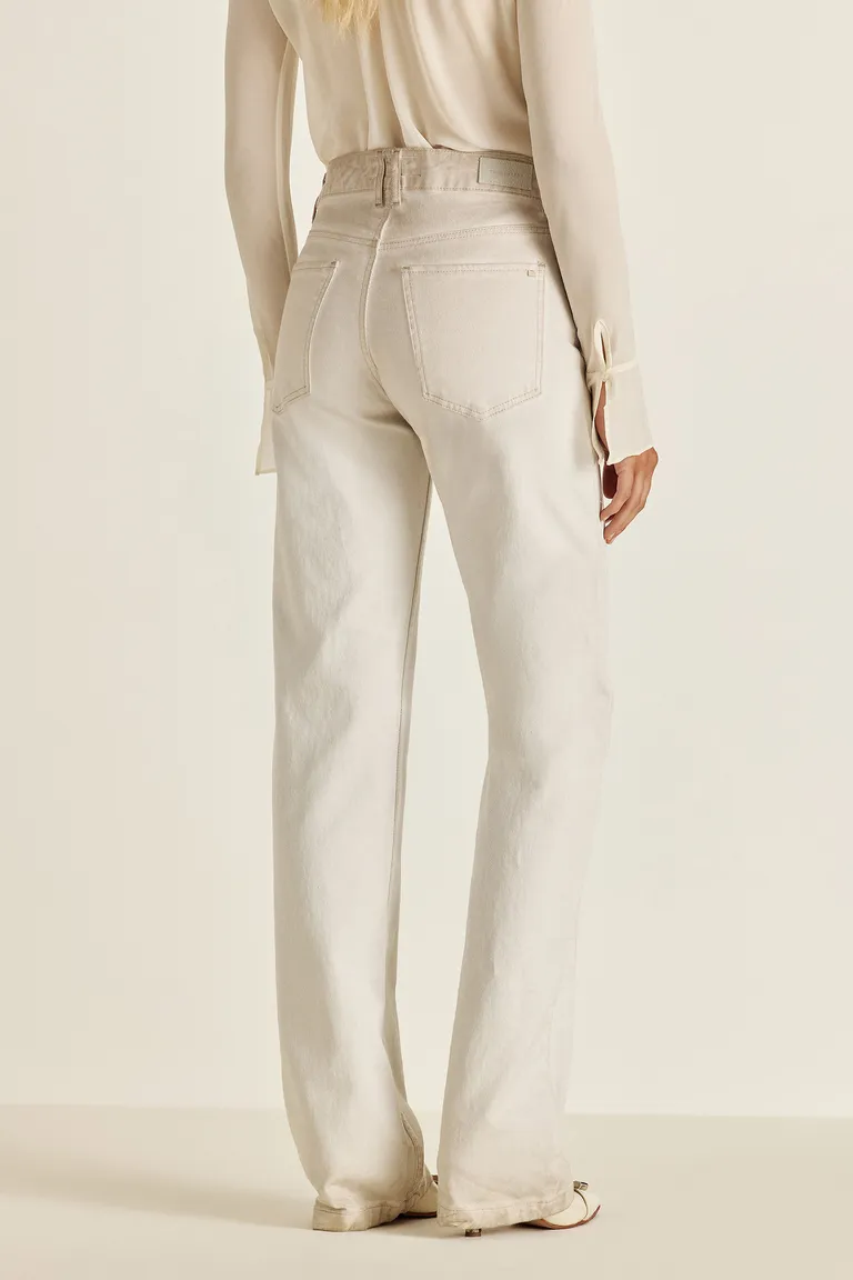 Pantalón de denim de tiro alto en color off white con acabado sucio y detalles exclusivos de Tucci en Pantalones para argentina