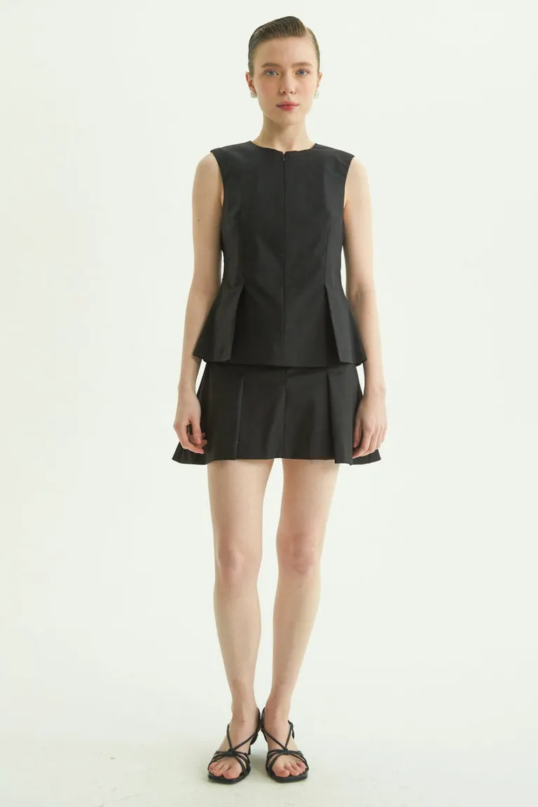 Falda mini estructura tablas y cierre invisible, diseño elegante y chic de Las Pepas en Faldas para argentina