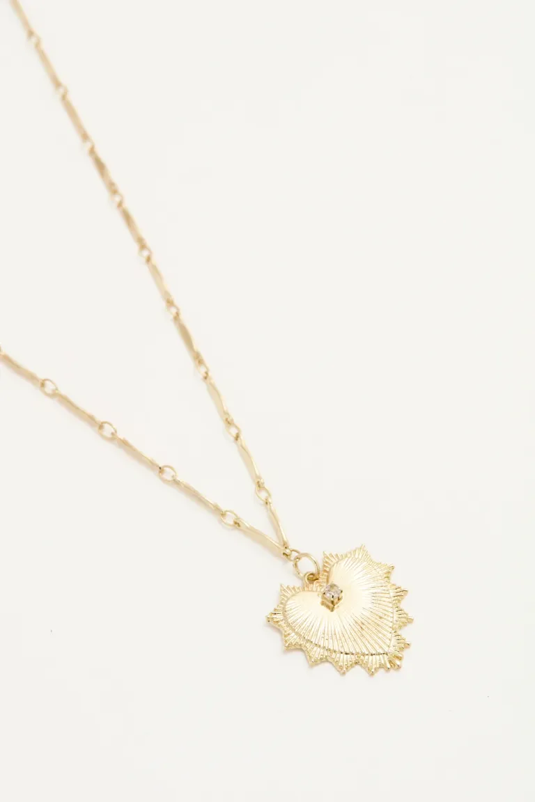 Collar de cadena texturada con dije de corazón y strass dorado de Rapsodia en Bijouterie para argentina