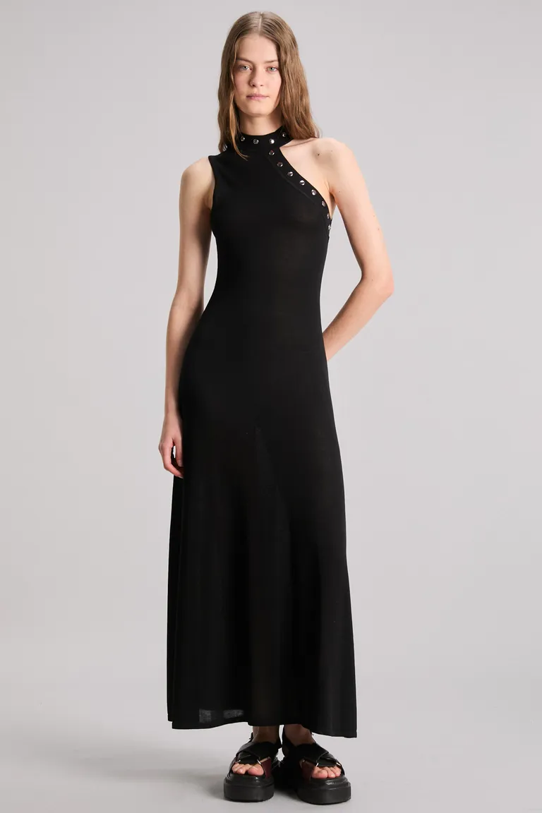 Vestido maxi de punto negro con escote asimétrico y detalles tubulares de Kosiuko en Vestidos para argentina