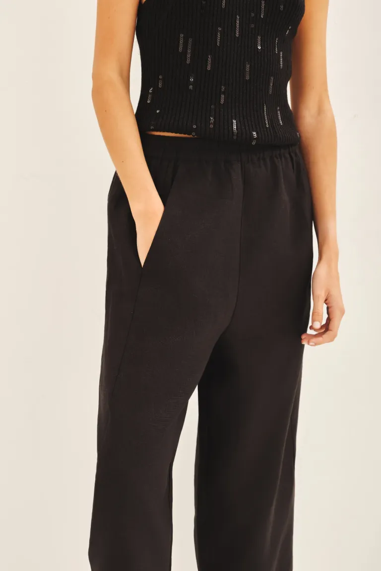 Pantalones babuchas de lino, corte ancho y cintura elástica de Rapsodia en Pantalones para argentina