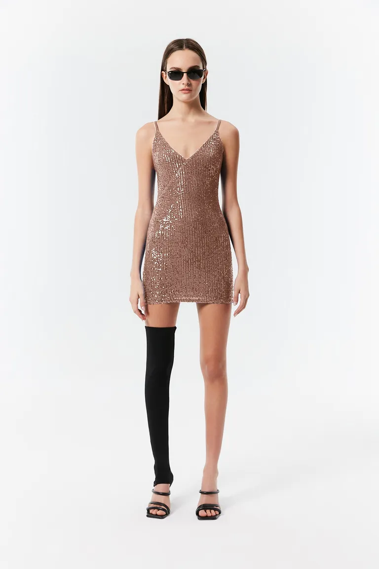 Vestido corto ajustado con escote V y breteles regulables para eventos especiales de Naíma en Vestidos para argentina