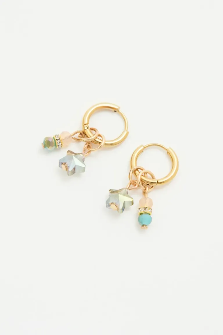 Juego de aros colgantes con dijes de estrellas facetadas y piedras brillantes de Rapsodia en Bijouterie para argentina
