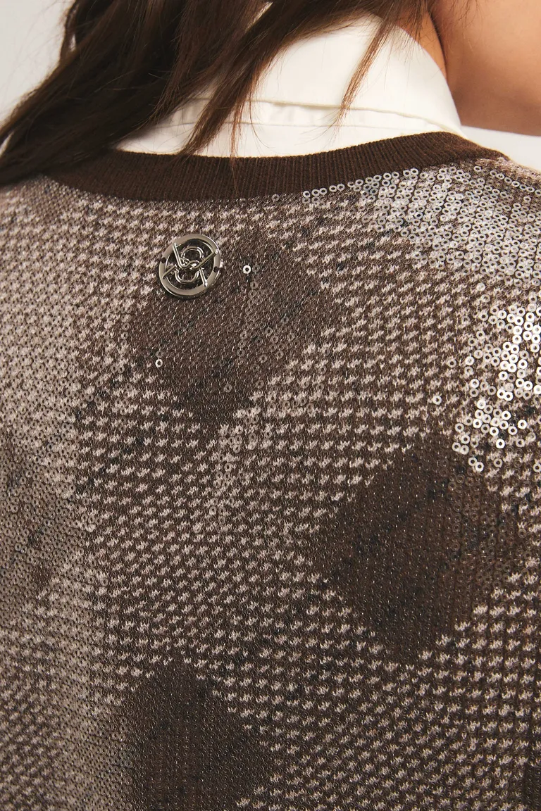 Chaleco sin mangas con escote en V, cierre a botones y tejido de jacquard con lentejuelas bordadas de Kosiuko en Chalecos para argentina