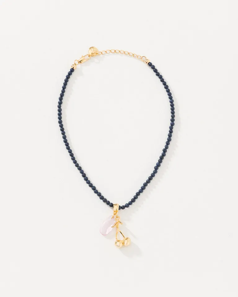 Collar con dije en forma de cereza: accesorio de moda en tono bronce de Jazmin Chebar en Bijouterie para argentina
