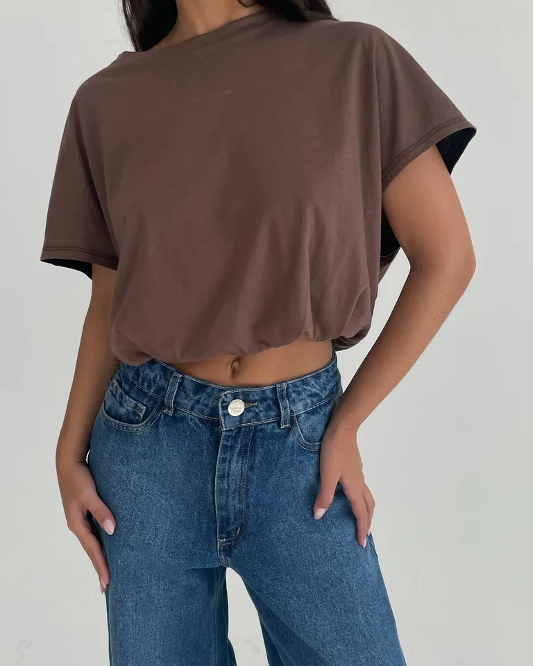 Remera de algodón, estilo ballon, con elástico en la cintura, disponible en diferentes tallas de Naíma en Remeras para argentina