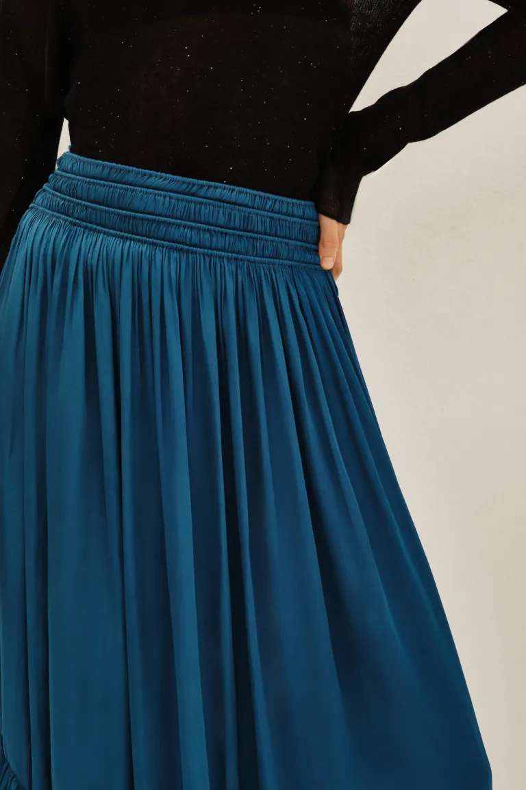 Falda larga con cintura elastizada y detalle de volados en el ruedo de Rapsodia en Faldas para argentina