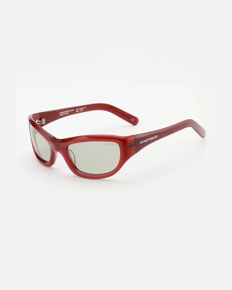 Gafas de acetato rojo con lentes polarizadas y protección UV de Ay Not Dead en Anteojos para argentina