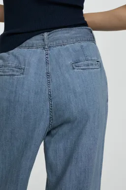 Pantalón fluido wideleg cinturón de Mango en Pantalones para argentina