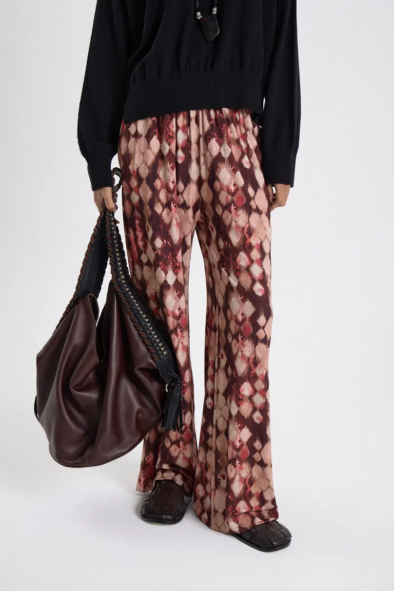 Pantalón estilo oxford de calce relajado con botamanga amplia y elástico en la cintura de Maria Cher en Pantalones para argentina