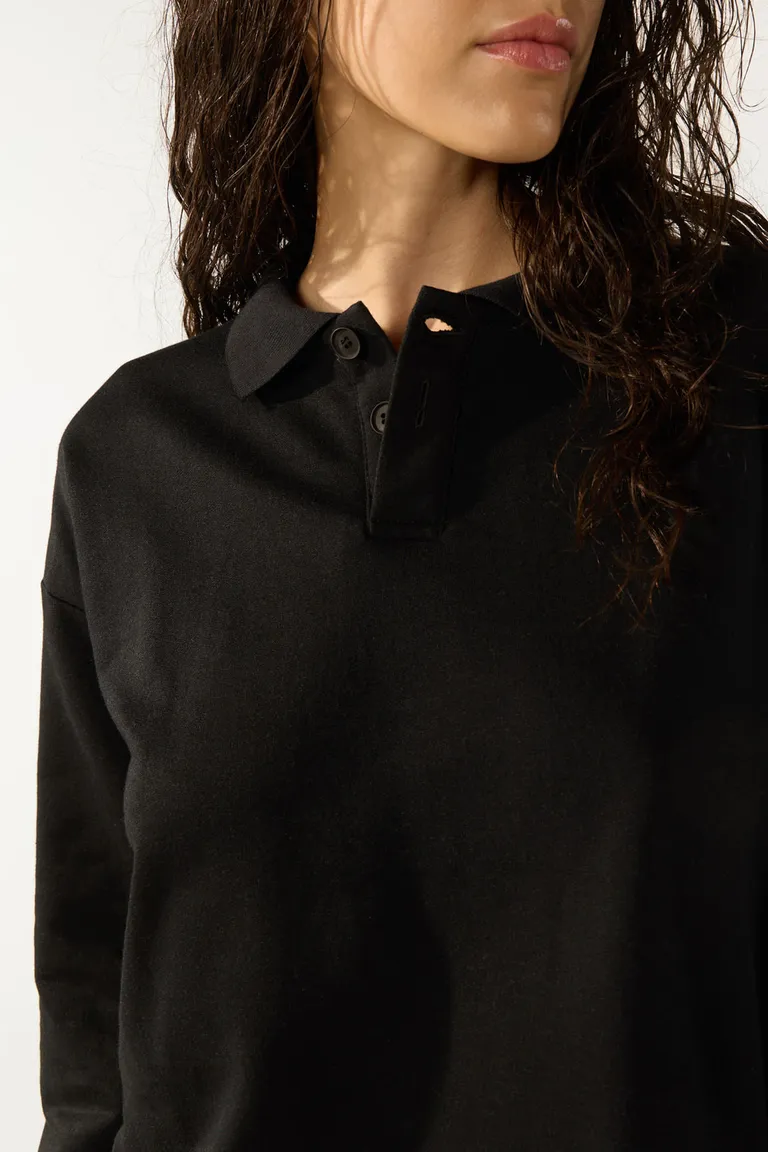 Buzo de diseño en tejido suave y cómodo en color negro de Cuesta Blanca en Buzos y Sweaters para argentina