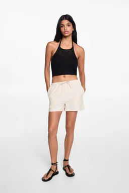 Top crochet cuello halter de Mango Teen en Tops para argentina
