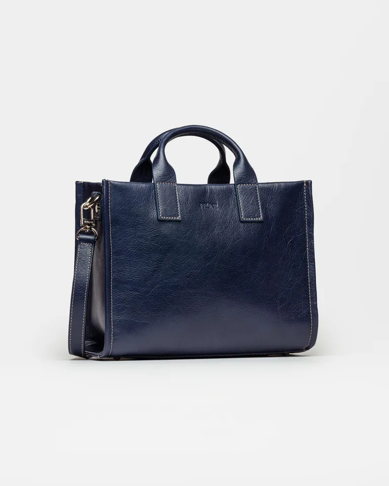 Cartera de mano Capri en cuero liso vegetal, de diseño práctico y chic de Prüne en Bolsos y Carteras para argentina