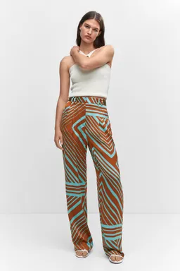 Pantalón satinado estampado de Mango en Pantalones para argentina
