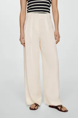 Pantalón lyocell con pinzas de Mango en Pantalones para argentina