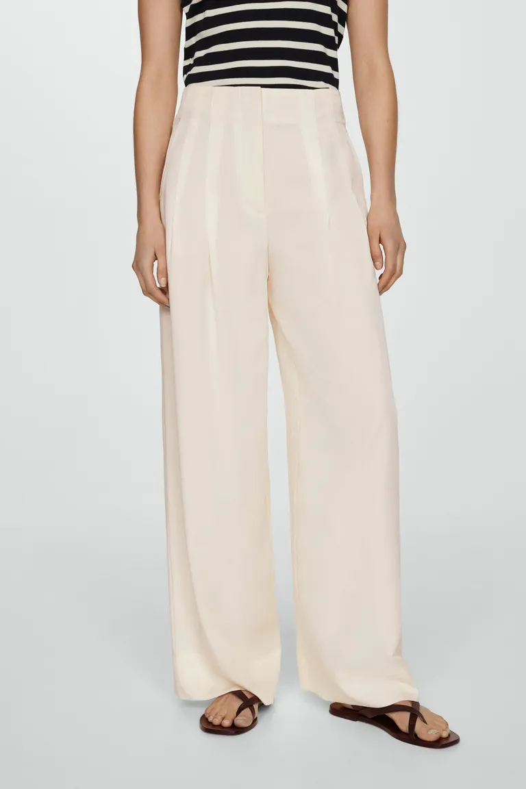 Pantalón lyocell con pinzas de Mango en Pantalones para argentina