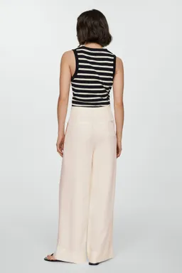 Pantalón lyocell con pinzas de Mango en Pantalones para argentina