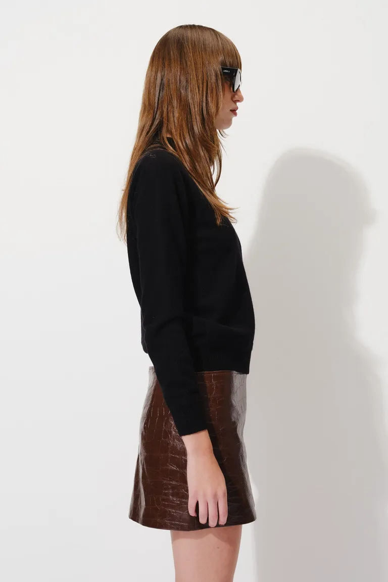 Falda corta con textura de tiro bajo y diseño recto de Mishka en Faldas para argentina