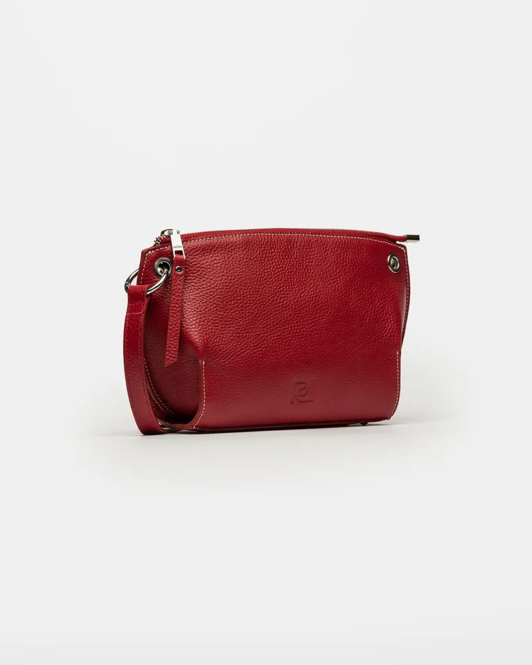 Cartera de cuero graneado de líneas curvas en un elegante tono rojo de Prüne en Bolsos y Carteras para argentina