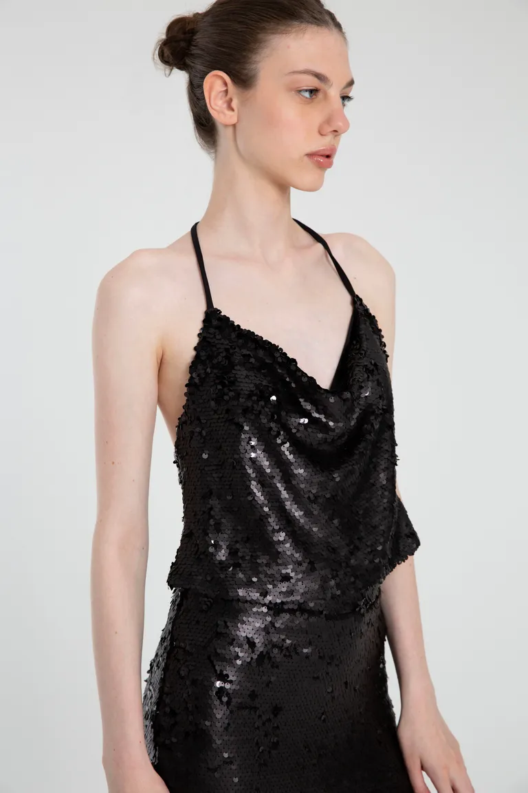 Top negro de lentejuelas con escote en V y espalda descubierta de Naíma en Tops para argentina