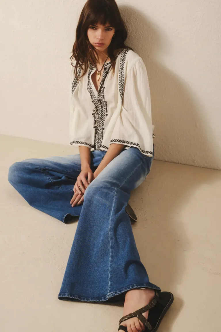 Pantalón de denim azul de tiro alto con diseño de pierna palazzo y acabado stone de Rapsodia en Pantalones para argentina