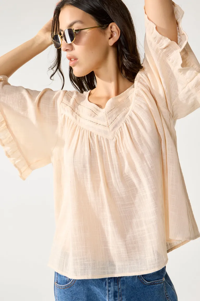 Blusa de algodón con detalles de volantes y aberturas en la espalda de Cuesta Blanca en Blusas para argentina