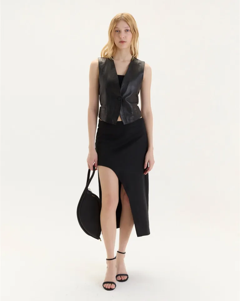 Chaleco en cuero ovino y lino con cierre y tiras ajustables de Blue Sheep en Chalecos para argentina