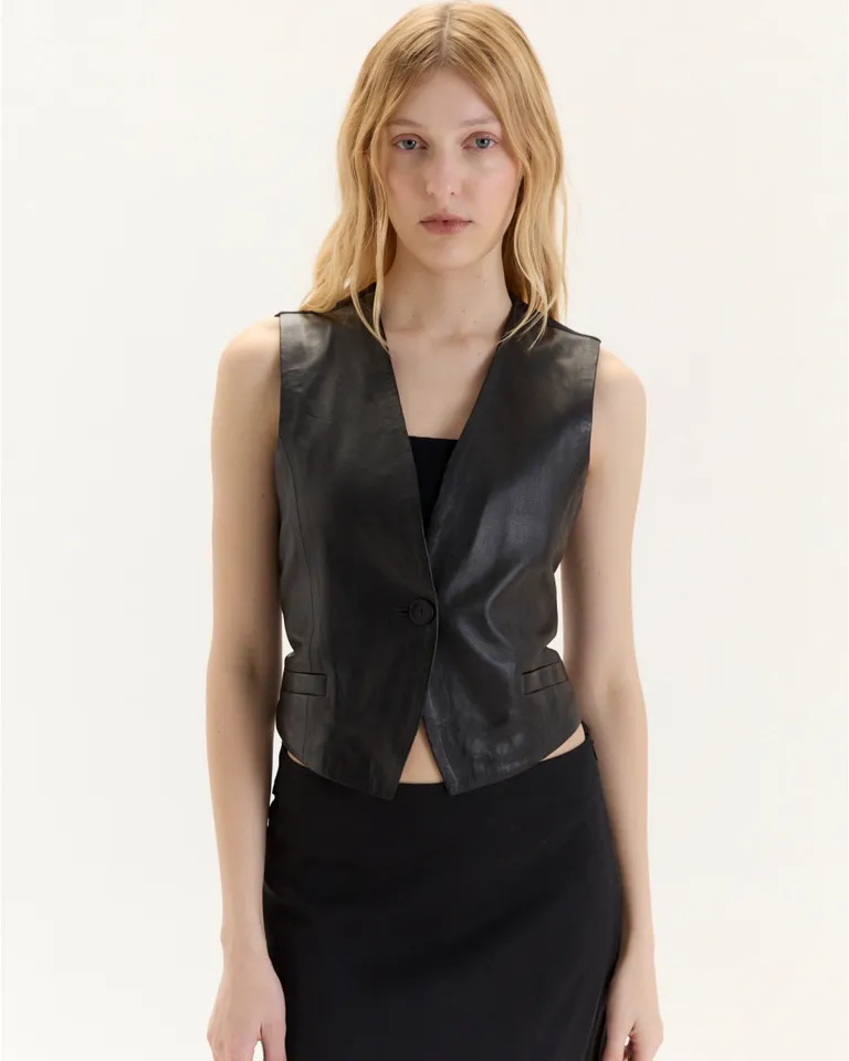 Chaleco en cuero ovino y lino con cierre y tiras ajustables de Blue Sheep en Chalecos para argentina