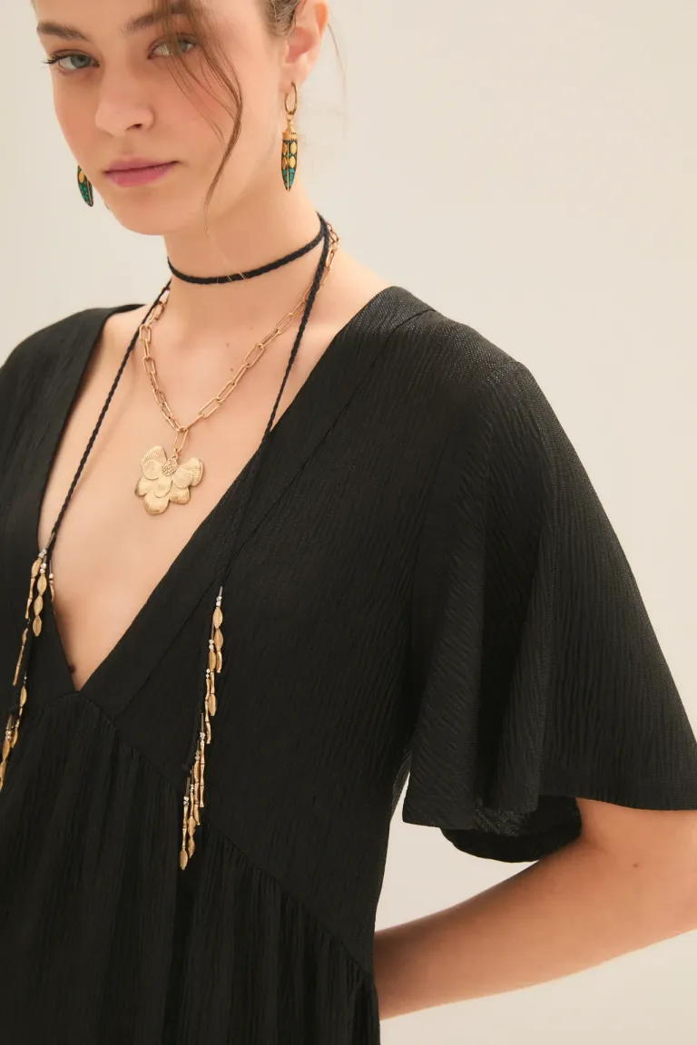 Vestido corto negro con escote en V y efecto foil de Rapsodia en Vestidos para argentina