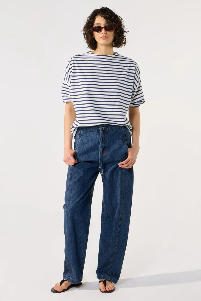 Pantalón de tiro alto en denim azul con pierna amplia y cintura ajustable de Cuesta Blanca en Pantalones para argentina